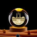 Boule de cristal gravée et socle lumineux — neuf gravures