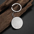 Collier médaillon rond gravé, finition argentée