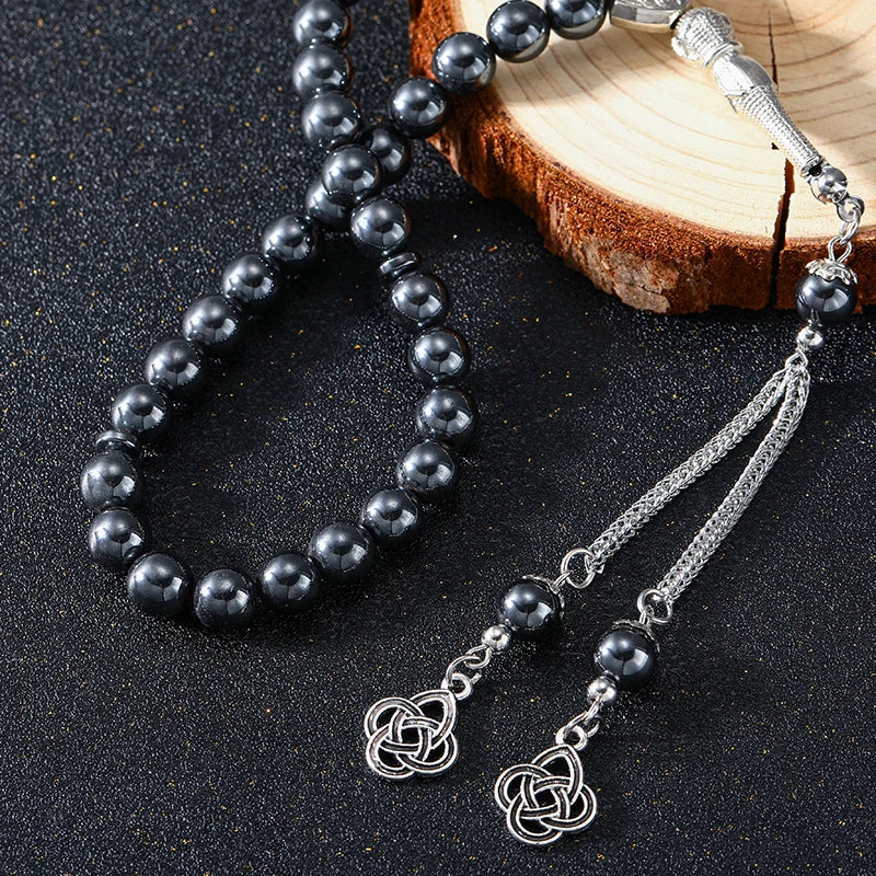 Tasbih en hématite naturelle — en main