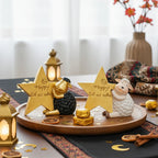 Mouton en résine adossé à une étoile dorée — décoration de l'Aïd al-Adha
