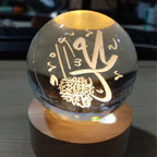 Boule de cristal gravée et socle lumineux — neuf gravures
